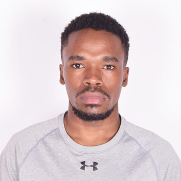 Bonface Maina, a senior software engineer, is seen in a grey shirt, looking directly at the camera with a calm demeanor.